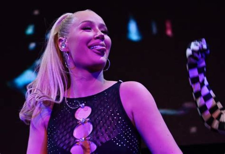 Iggy Azalea’s Fans Gush Over How ‘Perfect’ She Looks In Black Corset After Giving Birth — Pics